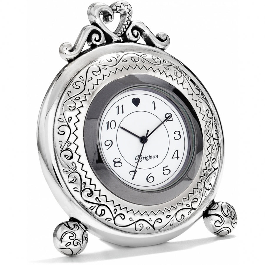 Silver-plated Memphis etched clock with a one-inch face diameter.