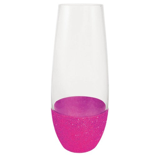 Pink glitter dipped champagne flute with a clear glass body.