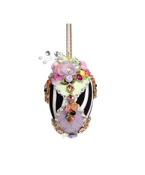 6-inch Harlequin egg ornament with jewel accents, floral fabric pattern, braided trim, and ribbon hanger.