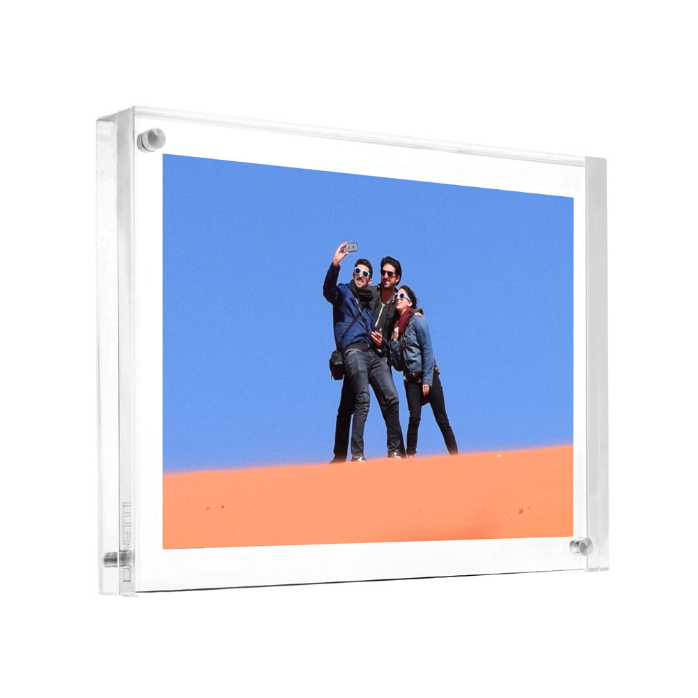 Original Magnet Frame in white finish with an 8.5x11 inch rectangular silhouette designed to hold photos.