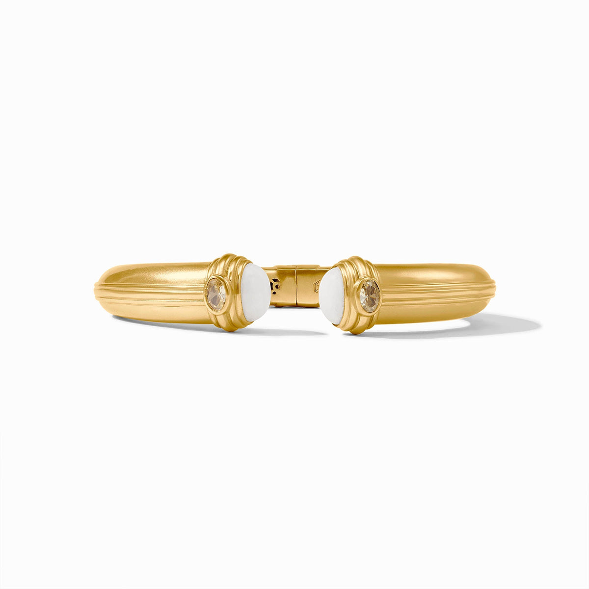 Portofino Cuff bracelet featuring a jade stone set in 24K gold plate with an imported glass accent and spring hinge closure.