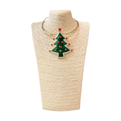 Gold collar necklace with a large green enamel Christmas tree pendant and red rhinestone details.