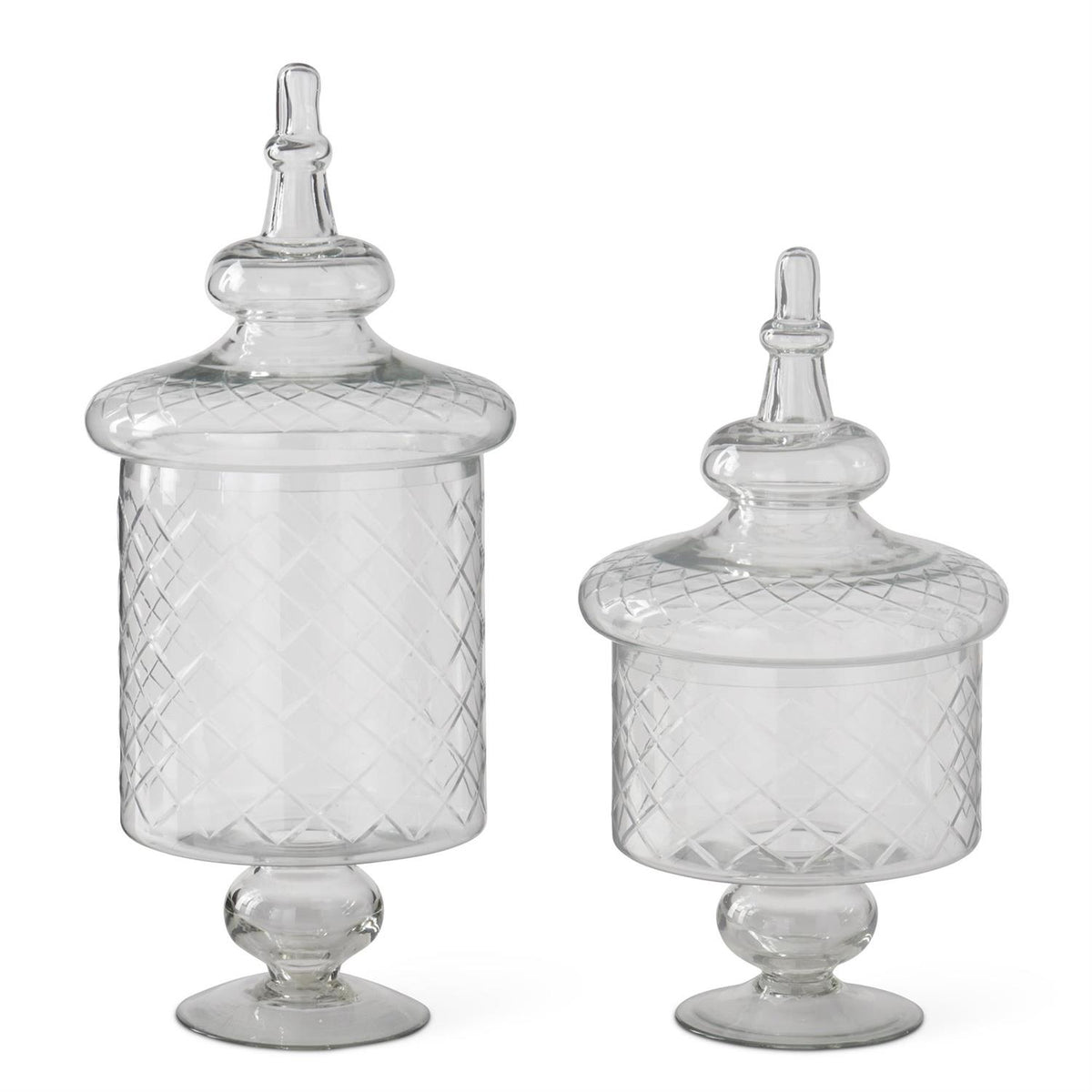 Clear glass lidded apothecary jar with etched pattern
