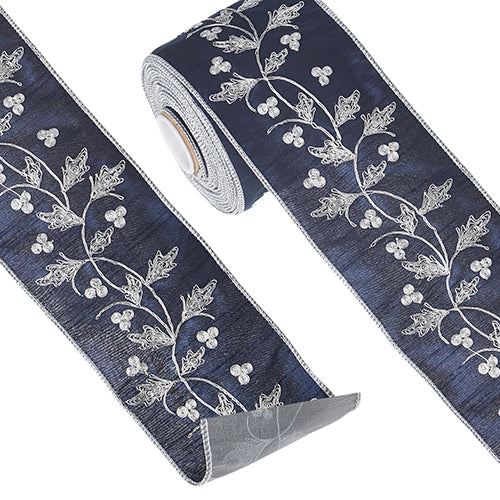 Four-inch wide polyester wired ribbon with holly and berry embroidery pattern in red and green.