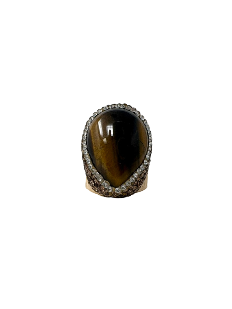 Queen of Sheba Fashion Ring featuring a large oval tiger's eye stone with a crystal halo.