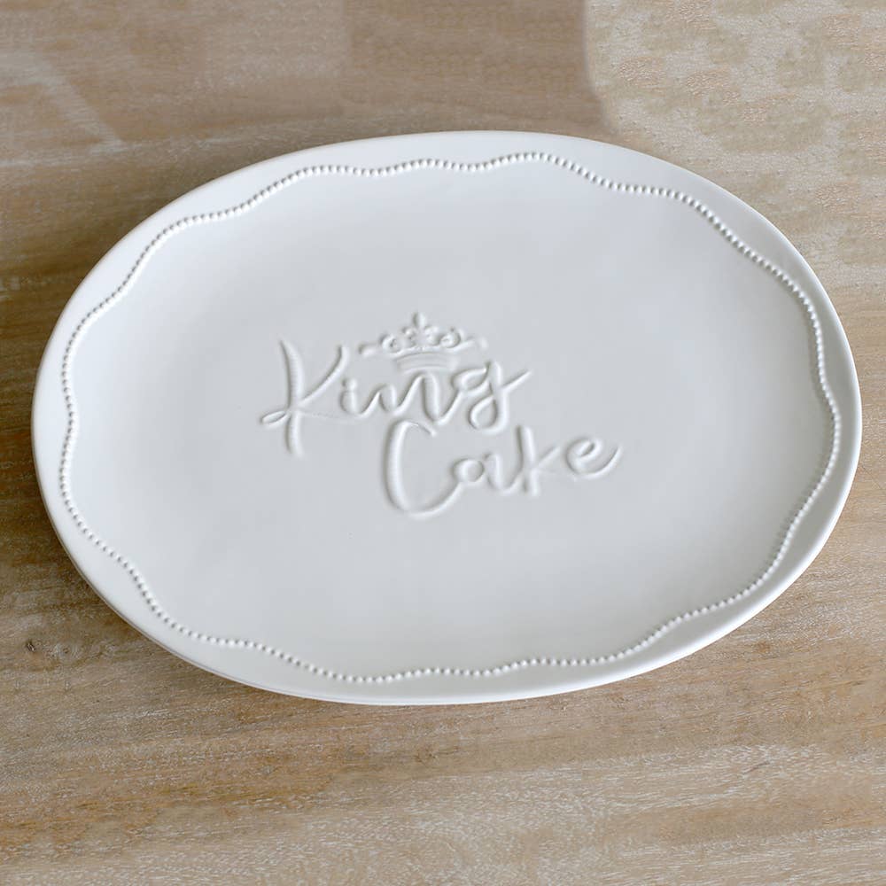 White dolomite fabric King Cake platter with a simple rectangular shape.