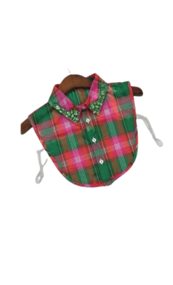 Green and red plaid faux collar with jeweled embellishments on the collar tips and white buttons.