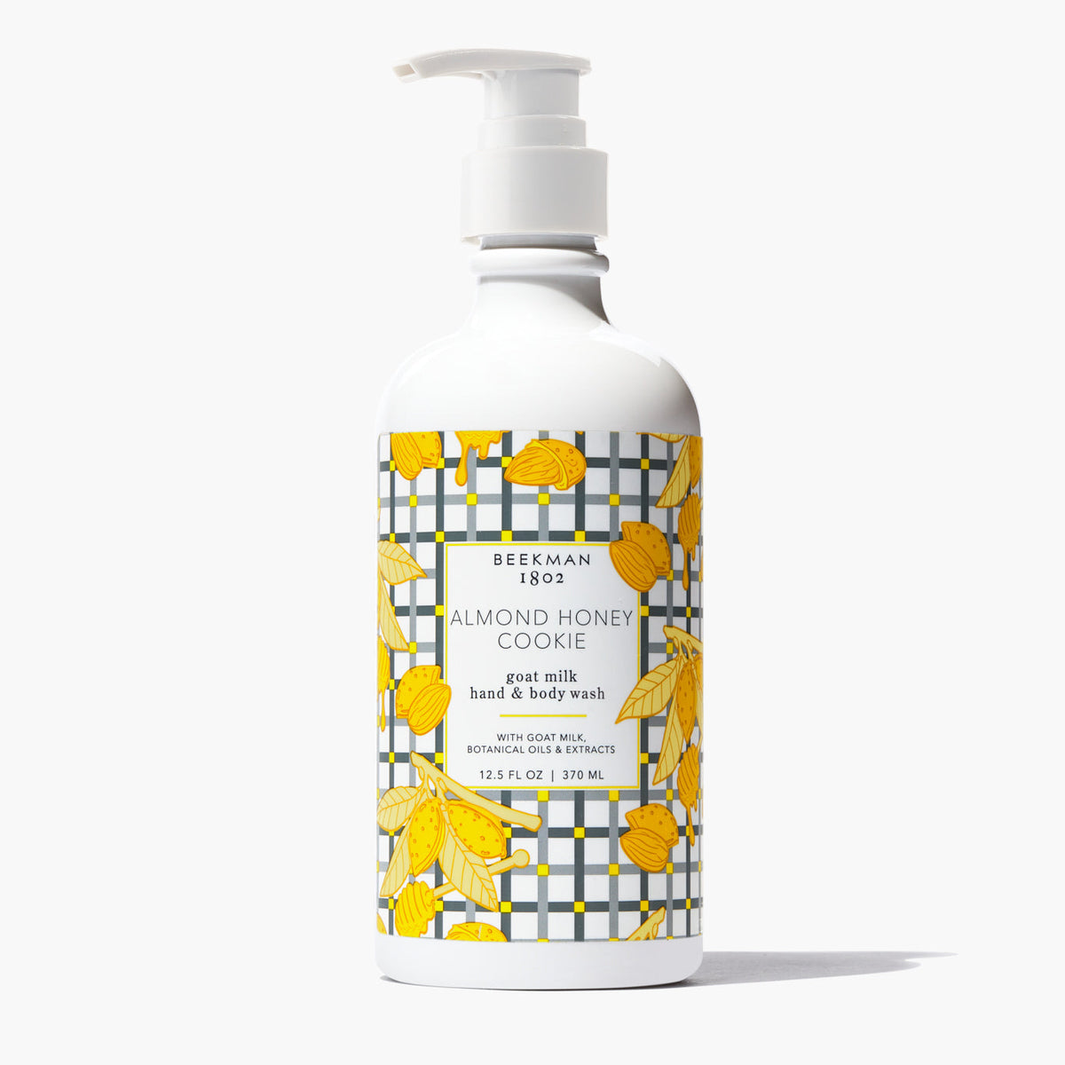 Beekman 1802 Almond Honey Cookie goat milk hand and body wash in a white pump bottle.