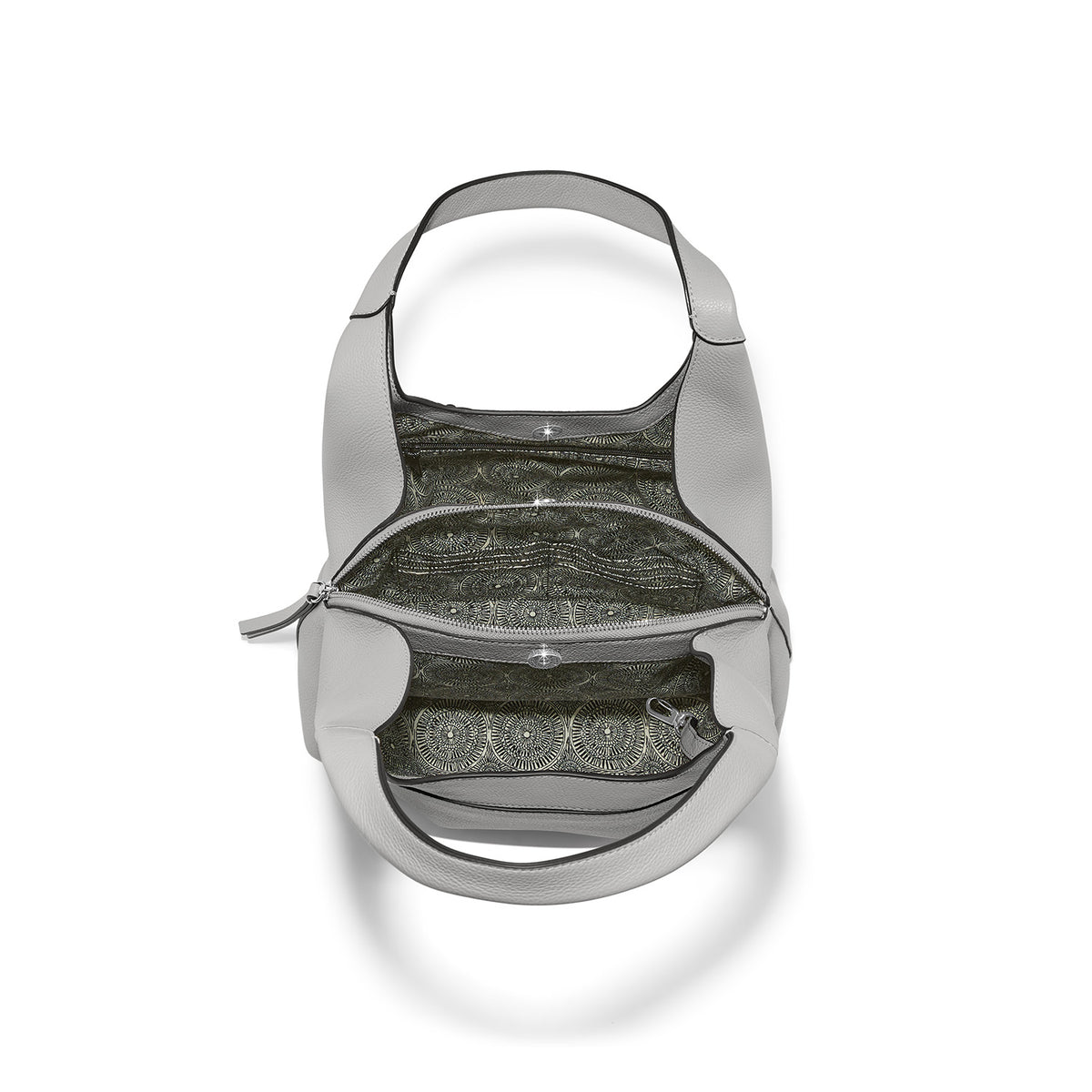 Interior view of the Sterling Interlock Selene Shoulder Bag showing multiple pockets and lining.