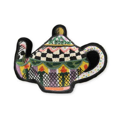 Teapot-shaped throw pillow with embellished cotton fabric in a neutral tone.