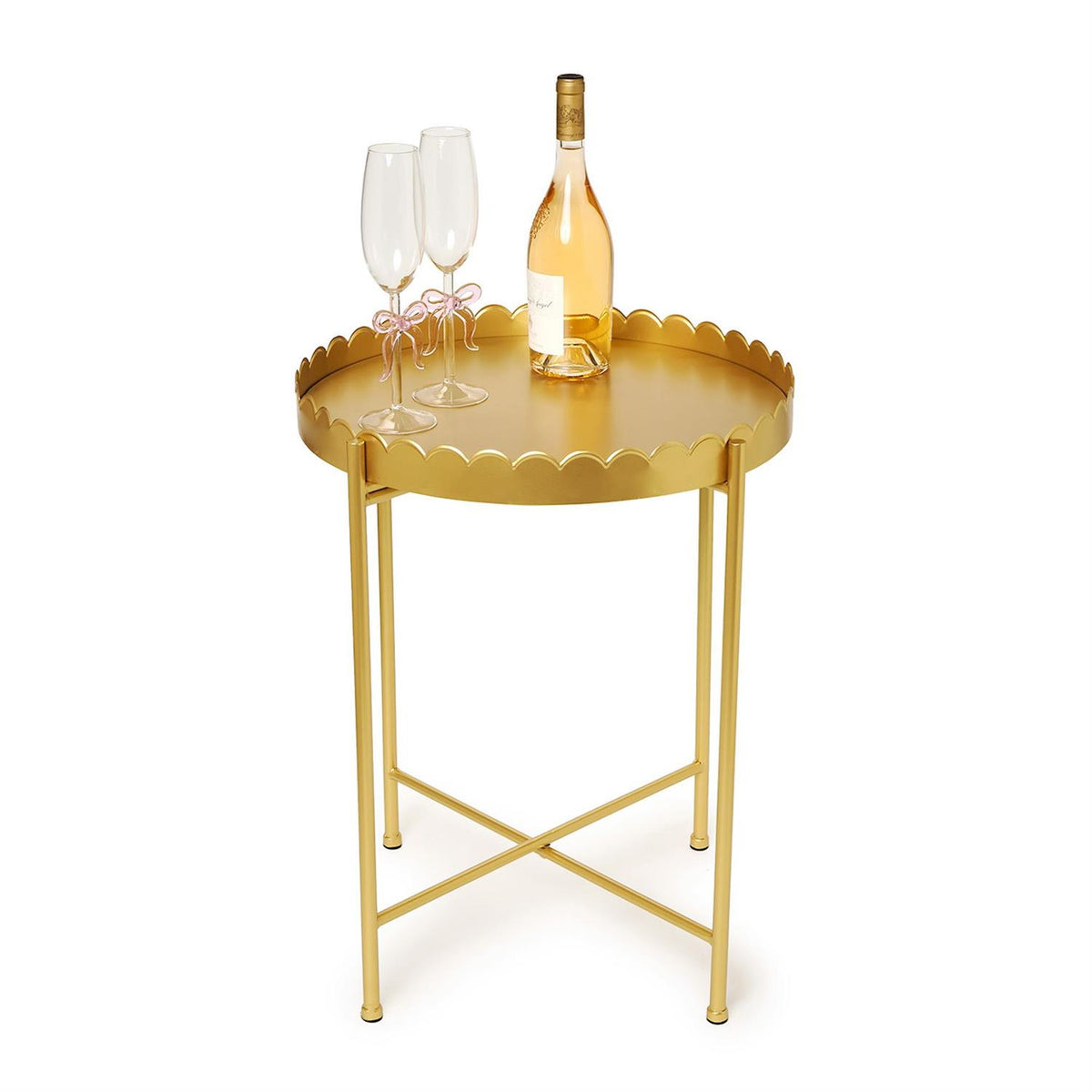 Round gold metallic side table with scalloped edge design