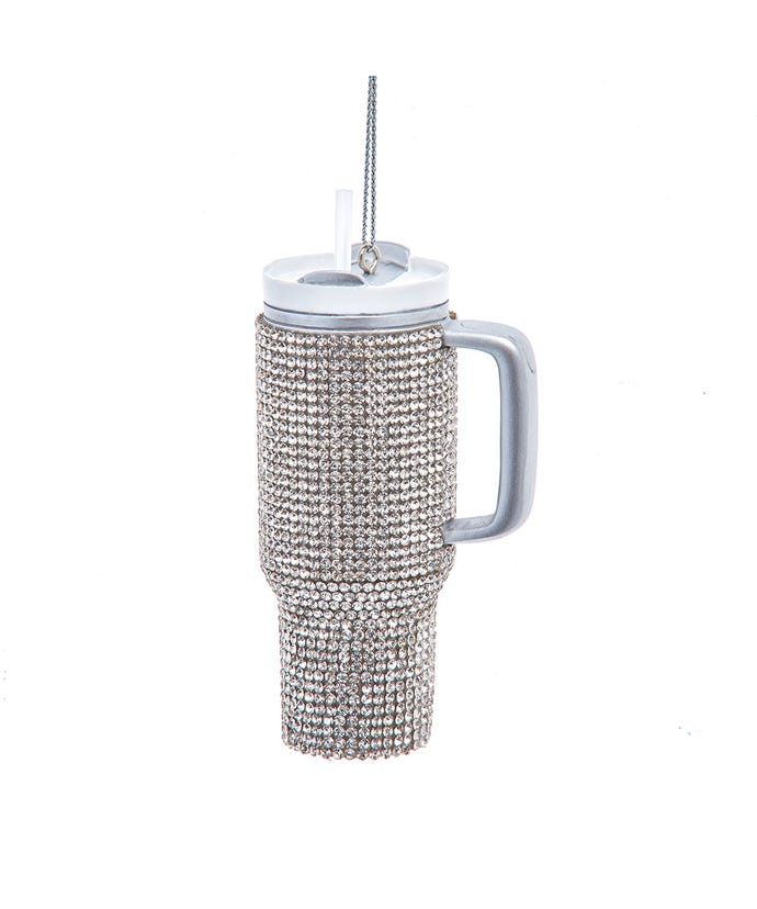 Crystal tumbler ornament made of resin with glass accents in a clear finish.
