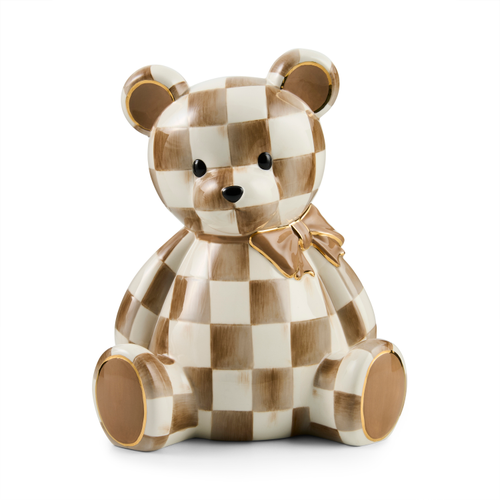 Ceramic mocha and white checkered teddy bear bank with a gold-trimmed bow and paws.