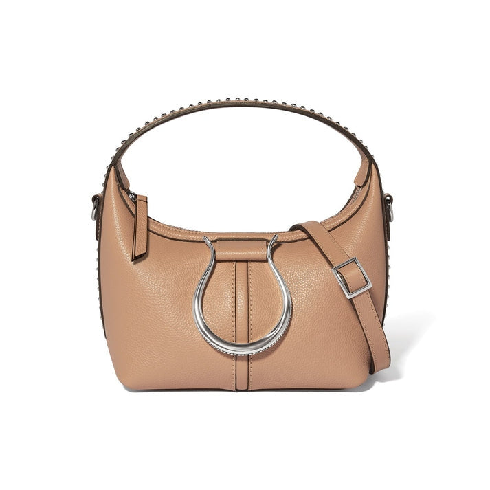 Tan pebbled leather cross body bag with silver horse bit hardware and studded top handle.