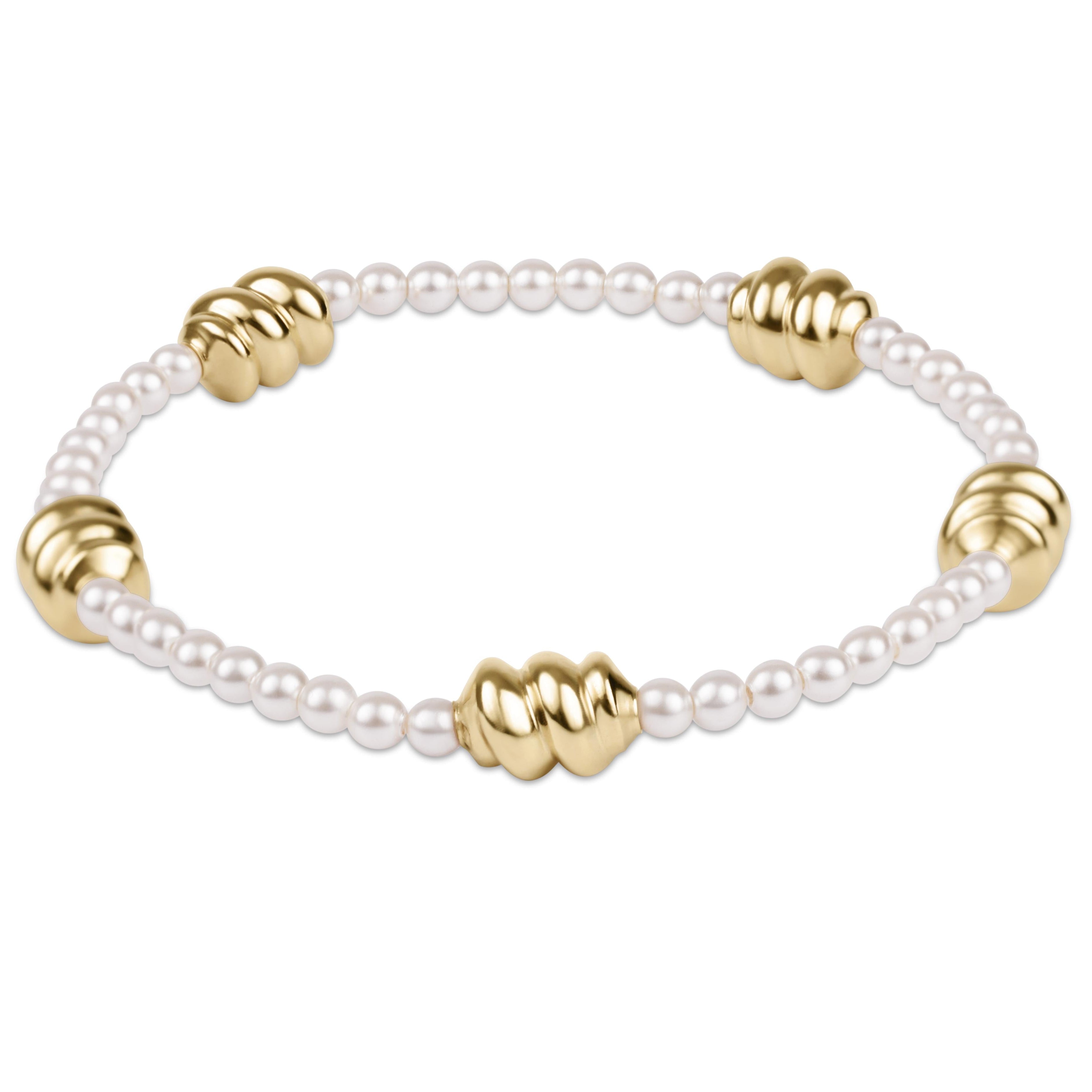 Gold-tone bracelet featuring a central 3mm pearl with delicate chain links.