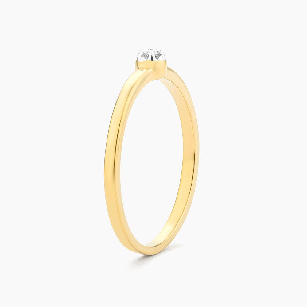 Stackable ring with a diamond halo centerpiece in silver metal.