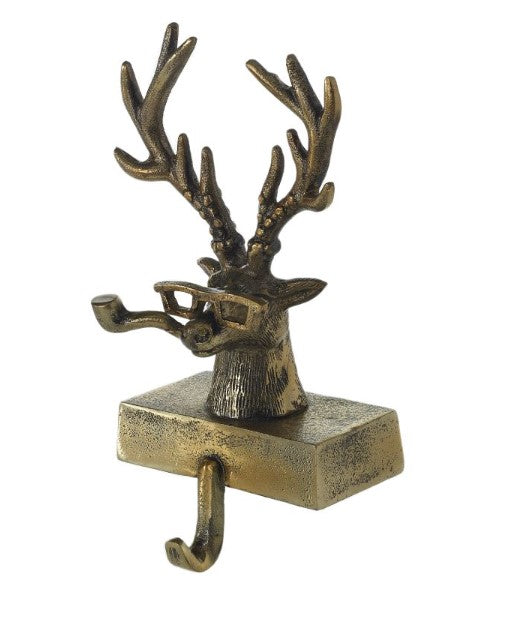 Metal stocking holder with a curved hook designed to hang stockings.