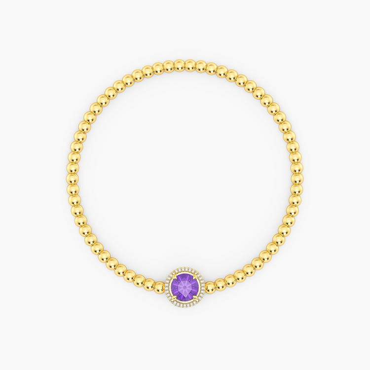 Gold-plated beaded bracelet with a round purple tanzanite center stone and diamond halo.