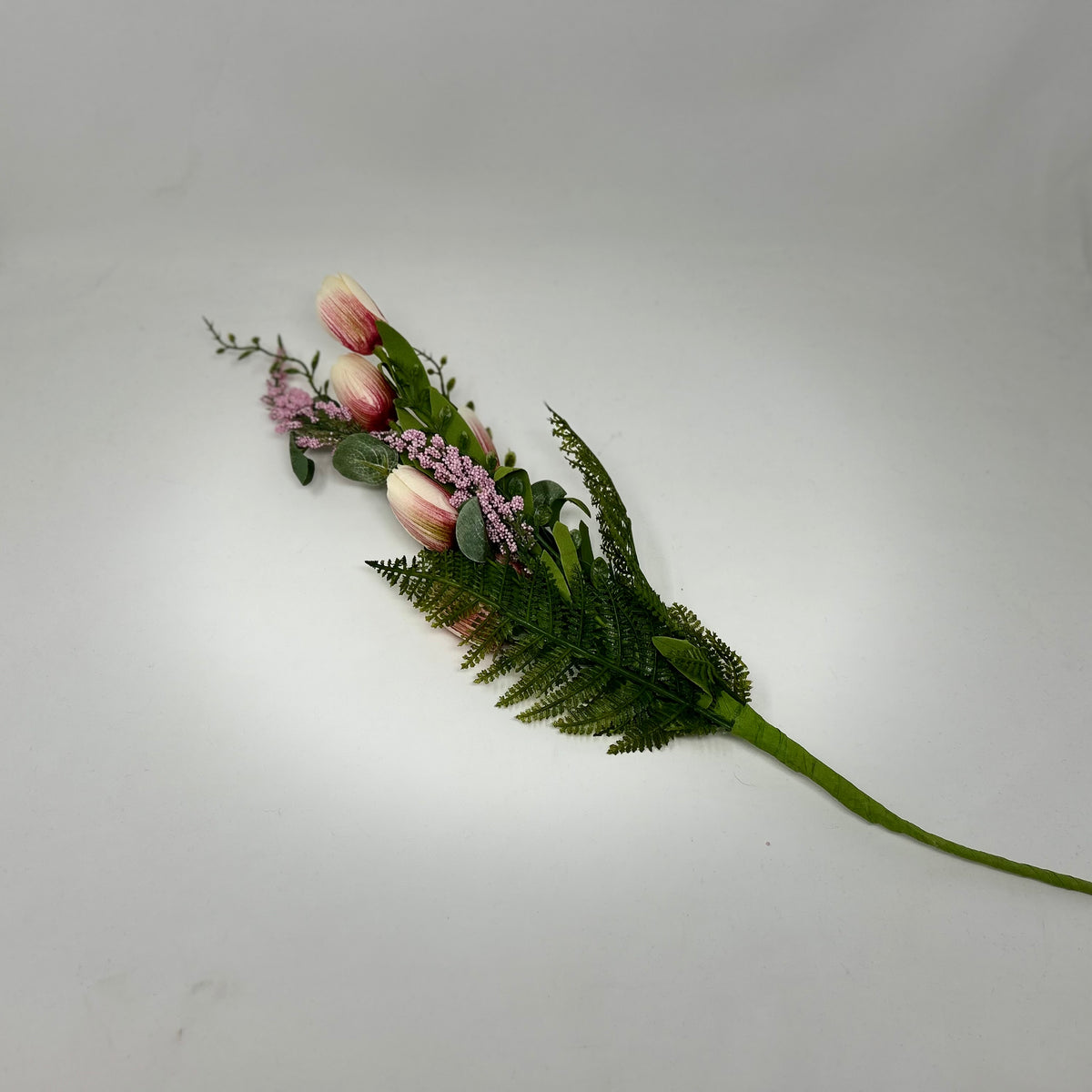 Tulip Bush artificial plant with green foliage in a clear vase