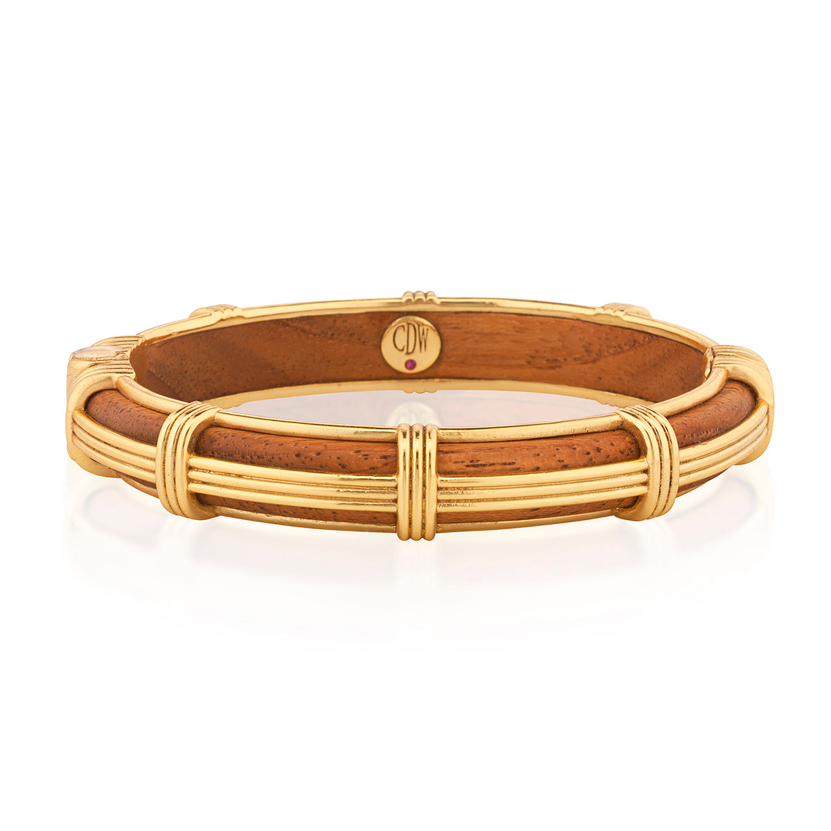 Gaia Petite Hinged Bangle in Teak with ribbed gold-tone metalwork and corded wrap accents.