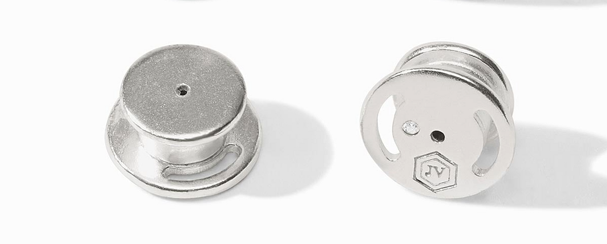 Pair of silver earring backs with Julie Vos hallmark on pure silver plate