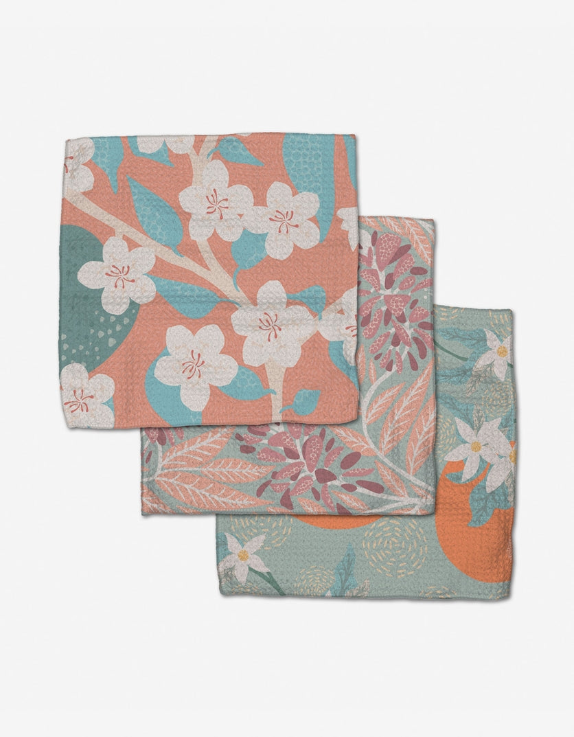 Set of three waffle weave dishcloths in recycled polyester with single-sided prints and hang loops.