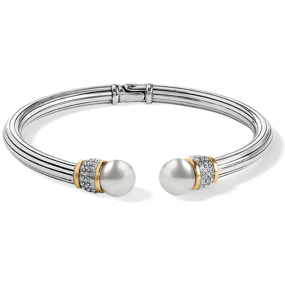 Silver-gold Meridian open hinged bangle with ribbed band and pearl-like ends accented with crystals.