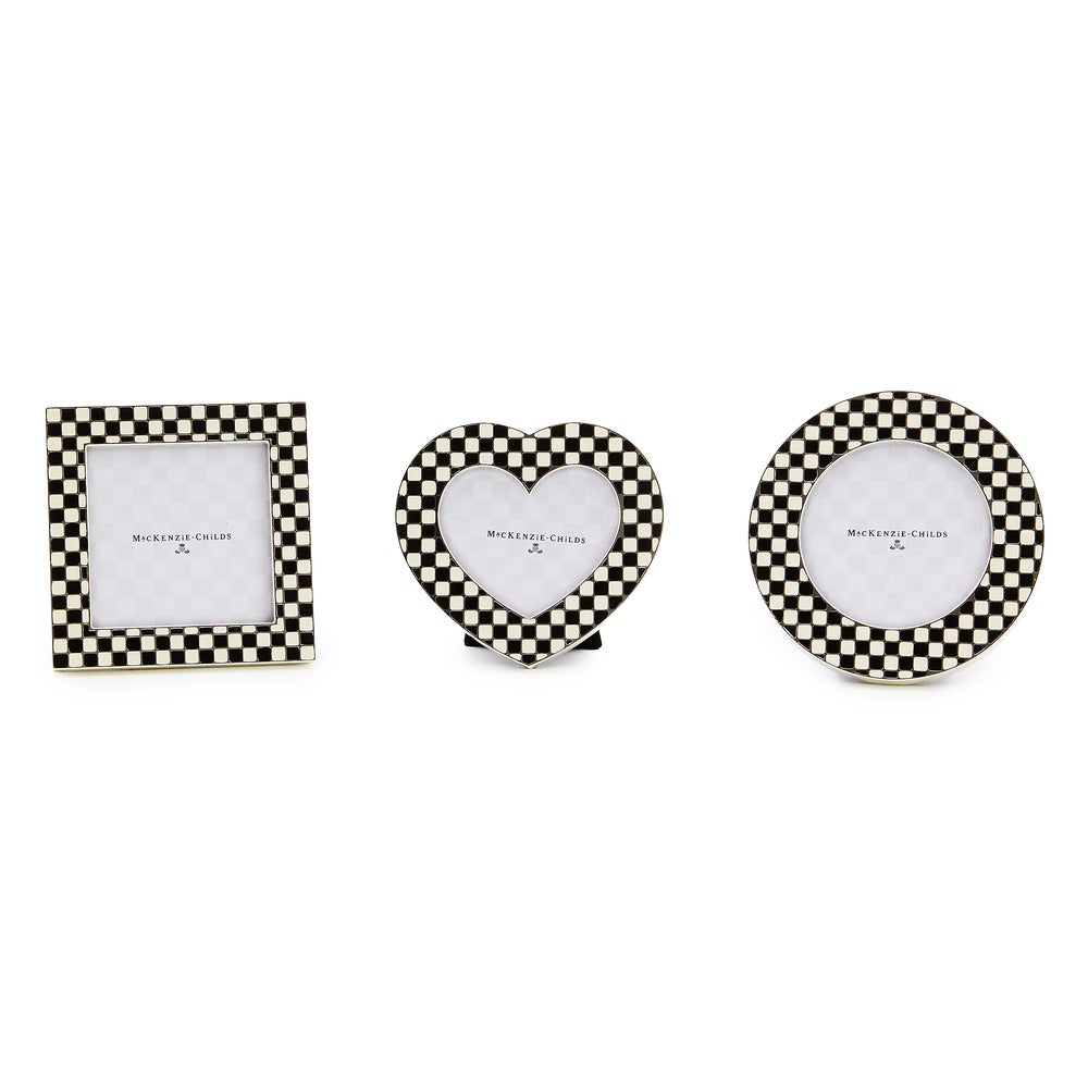 Set of three courtly frames in silver with velvet backing; heart, circle, and square shapes.