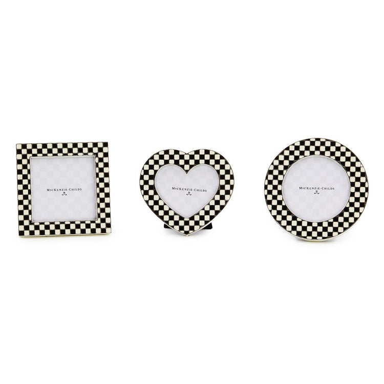 Set of three courtly frames in silver with velvet backing; heart, circle, and square shapes.