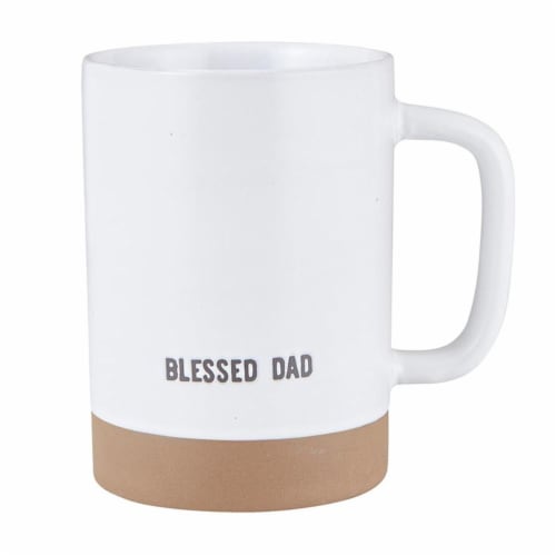 White ceramic mug with a tan base, featuring the text "BLESSED DAD" in gray.