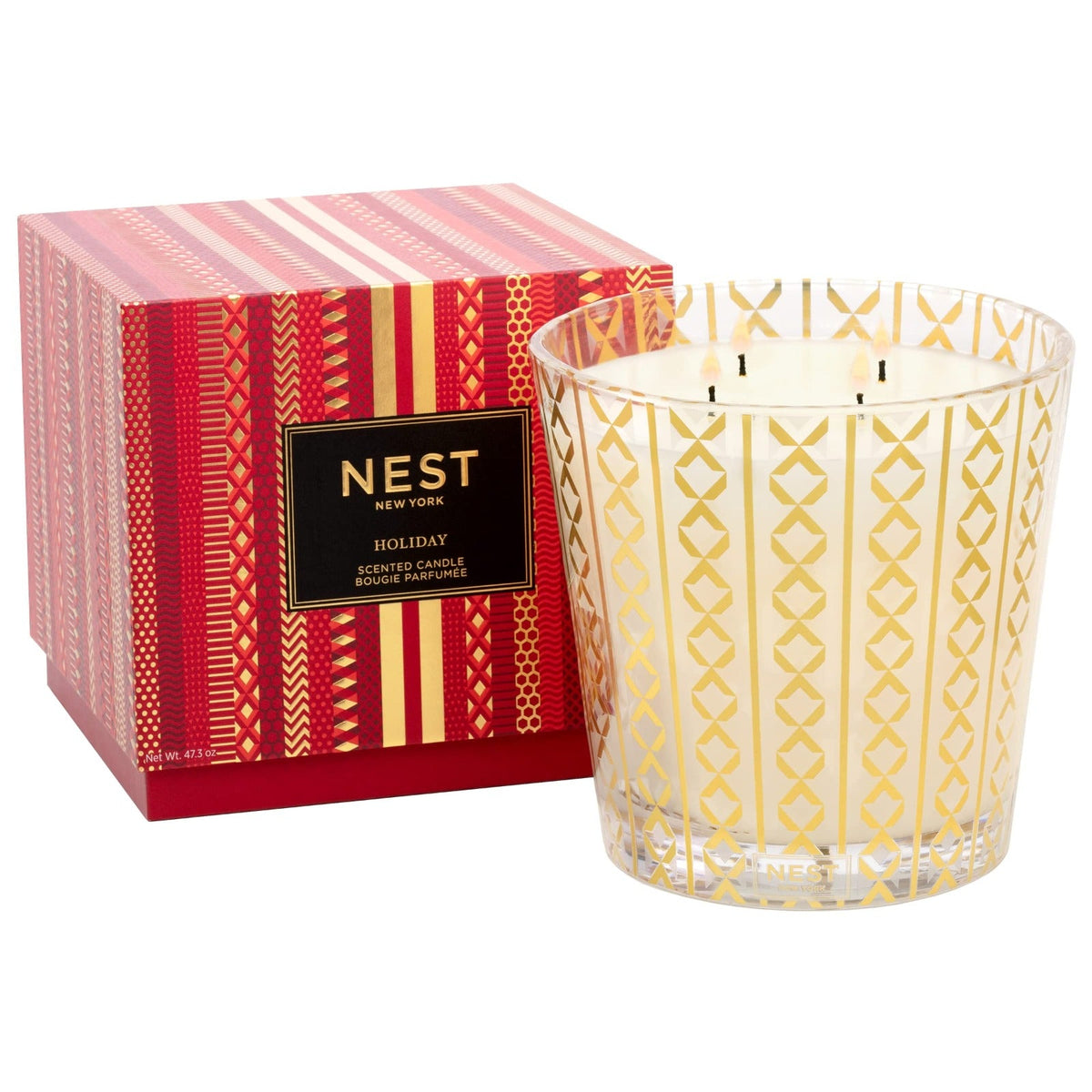 Nest Luxury four-wick candle in a reusable glass holder with cotton wicks.