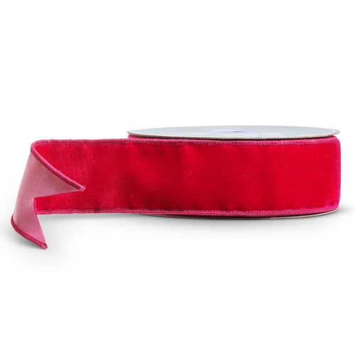 2.5 inch wide fuchsia pink velvet ribbon on a 10 yard spool.