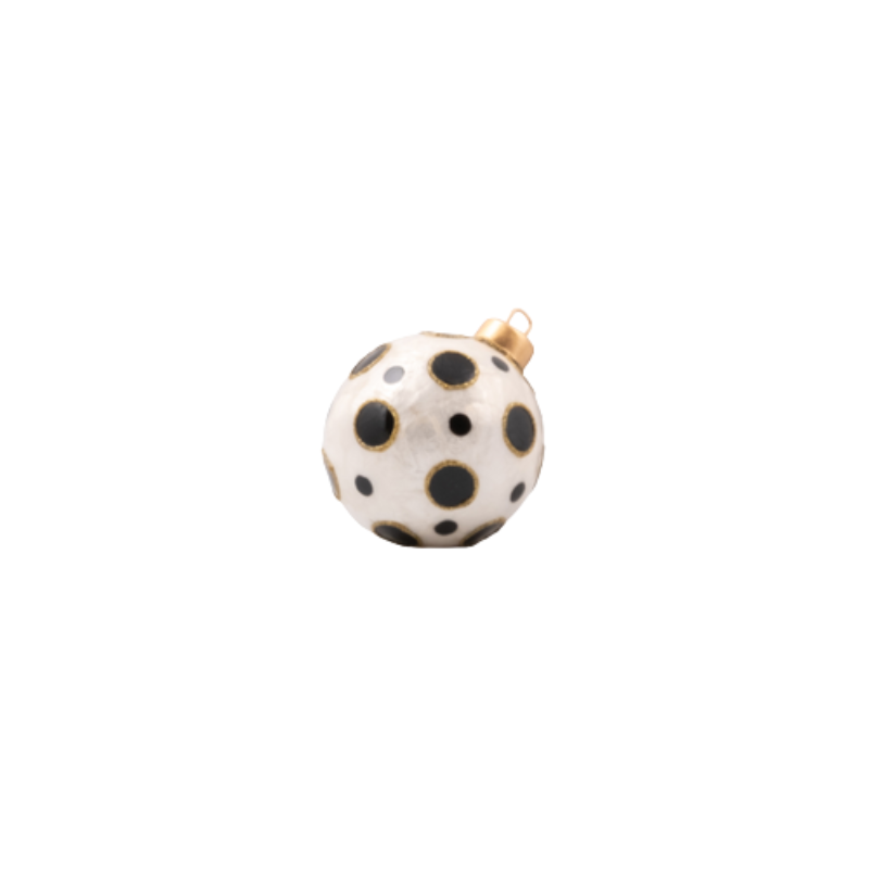 White capiz tabletop ornament ball with black polka dots and gold trim.