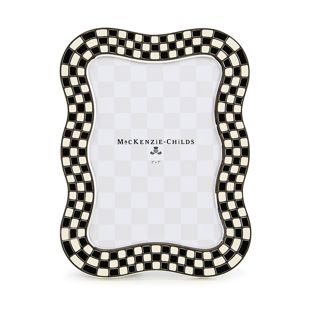 Silver-plated frame with enamel checks and glass insert on velvet backing
