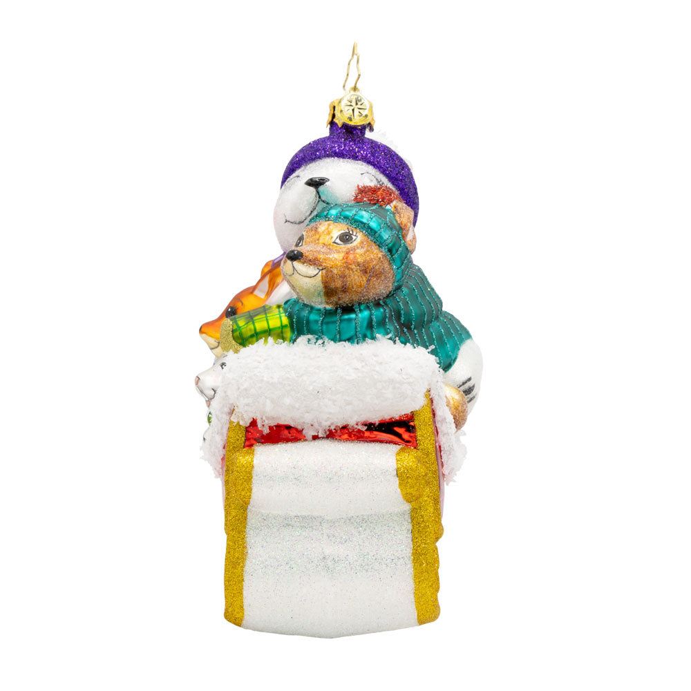 Tiny Tails & Jingle Bells glass ornament featuring animals in a glittery white and gold sleigh.