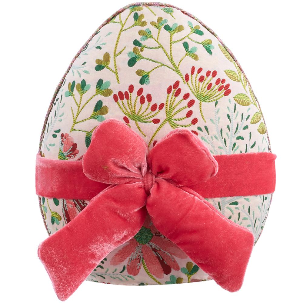 9.5-inch egg-shaped pouf in pink fabric with green polyfoam detailing