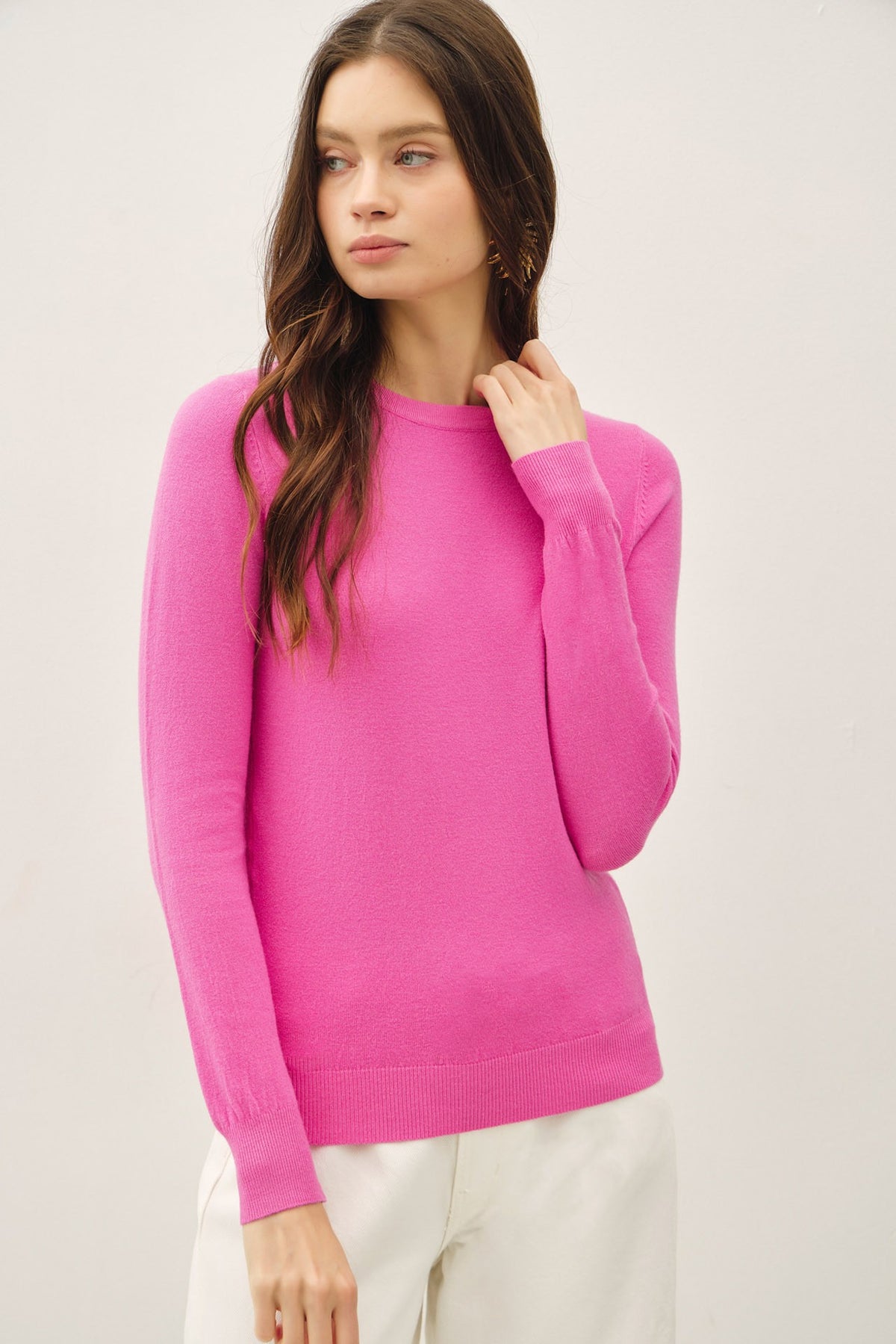 Relaxed fit Harper viscose knit sweater in solid color with crew neck and ribbed cuffs.