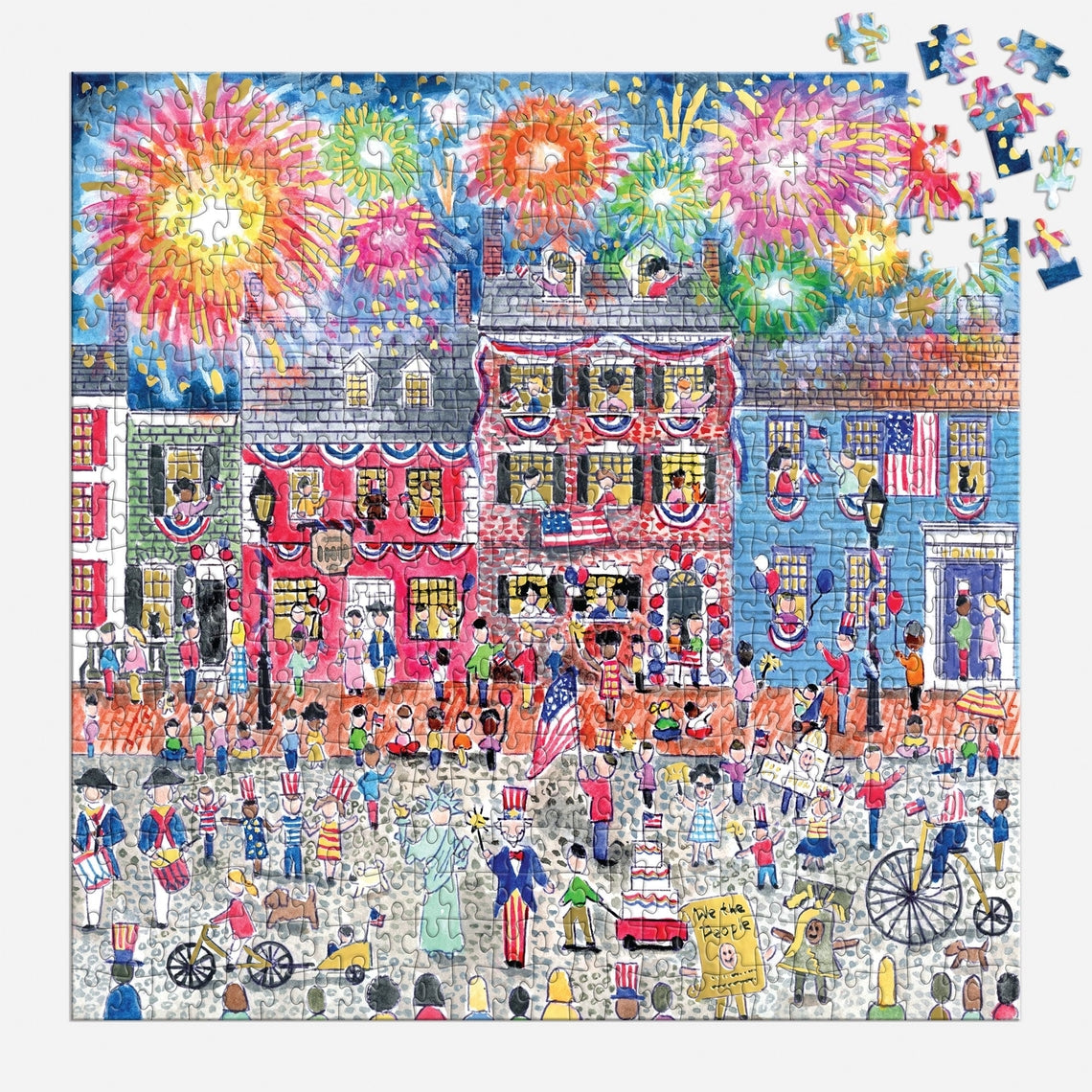 Michael Storrings Celebrate the USA 500-piece foil puzzle featuring fireworks and flags on greyboard.