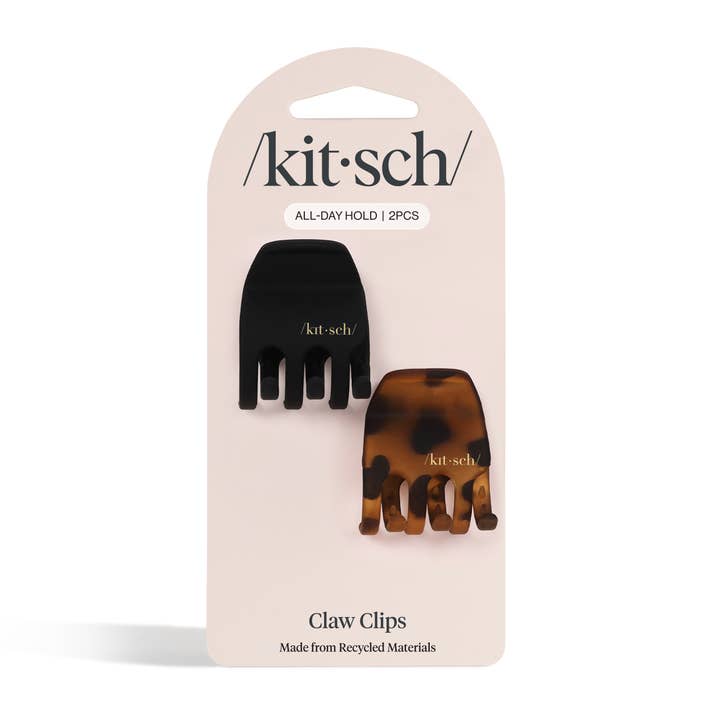 Two medium-sized eco-friendly claw clips in a neutral tone with a sleek silhouette.
