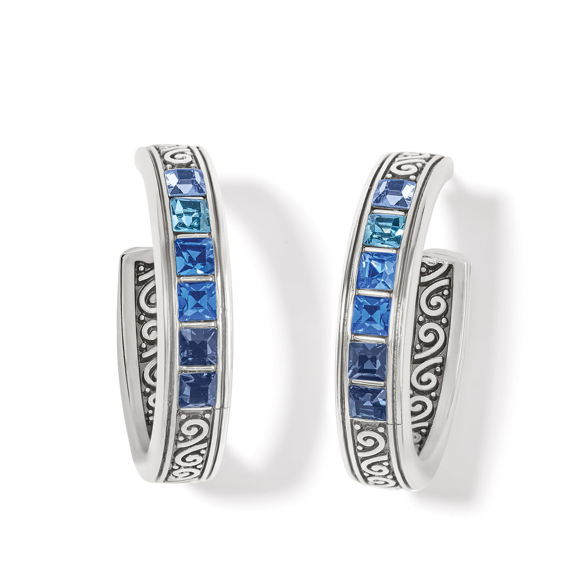 Silver plated hoop earrings with a light blue ombre spectrum of fine channel-set crystals.