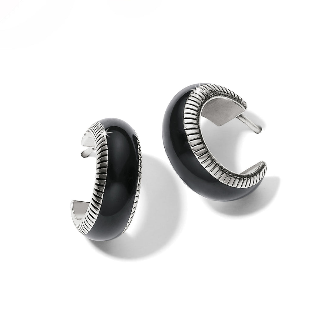 Silver-plated black enamel small hoop earrings with fine textured lines.