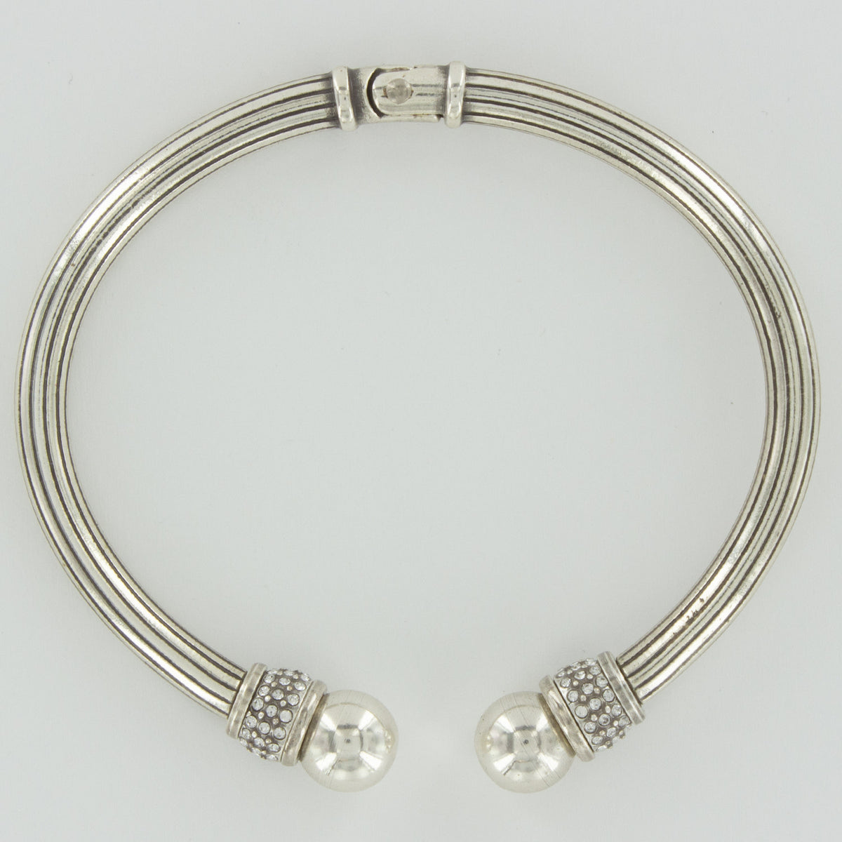 Silver hinged bangle with crystal accents from the Meridian Collection