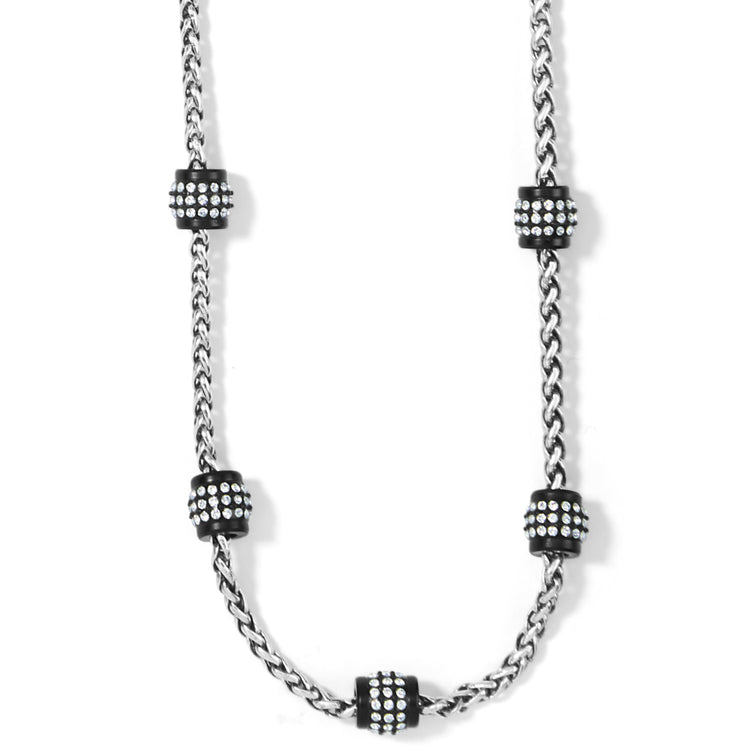 Adjustable silver-plated black lacquer station necklace with fine crystals on a delicate silhouette.