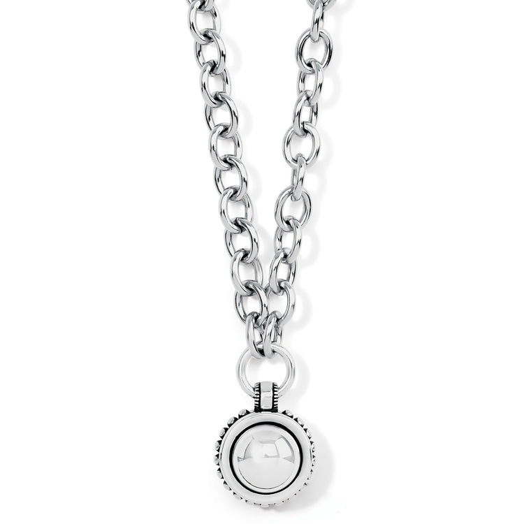 Silver plated adjustable stud necklace with bold circular pendant featuring fine quality crystals.