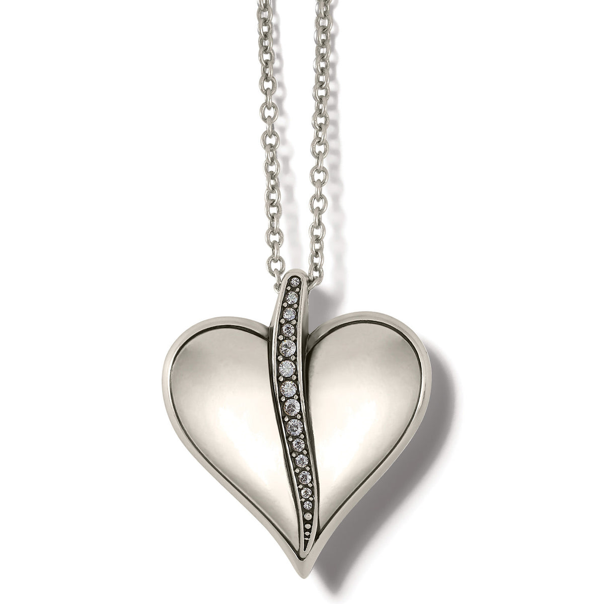 Silver plated adjustable necklace with a pillow-shaped heart pendant featuring fine crystals.