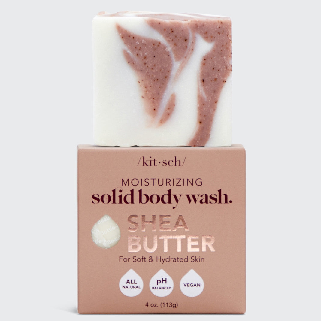 Kitsch Shea Butter Solid Body Wash bar with white and pink swirls on its cardboard packaging.
