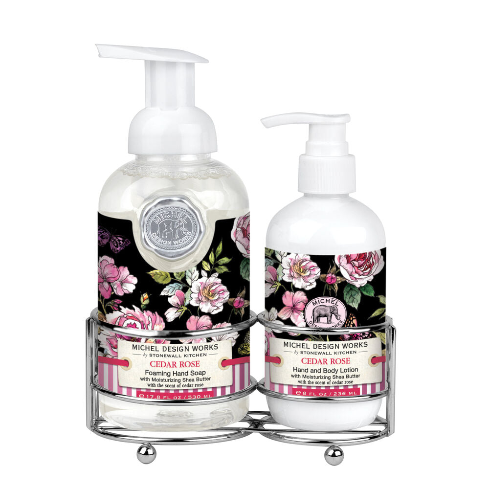 Foaming hand soap dispenser in white ceramic paired with a matching lotion bottle on a countertop.