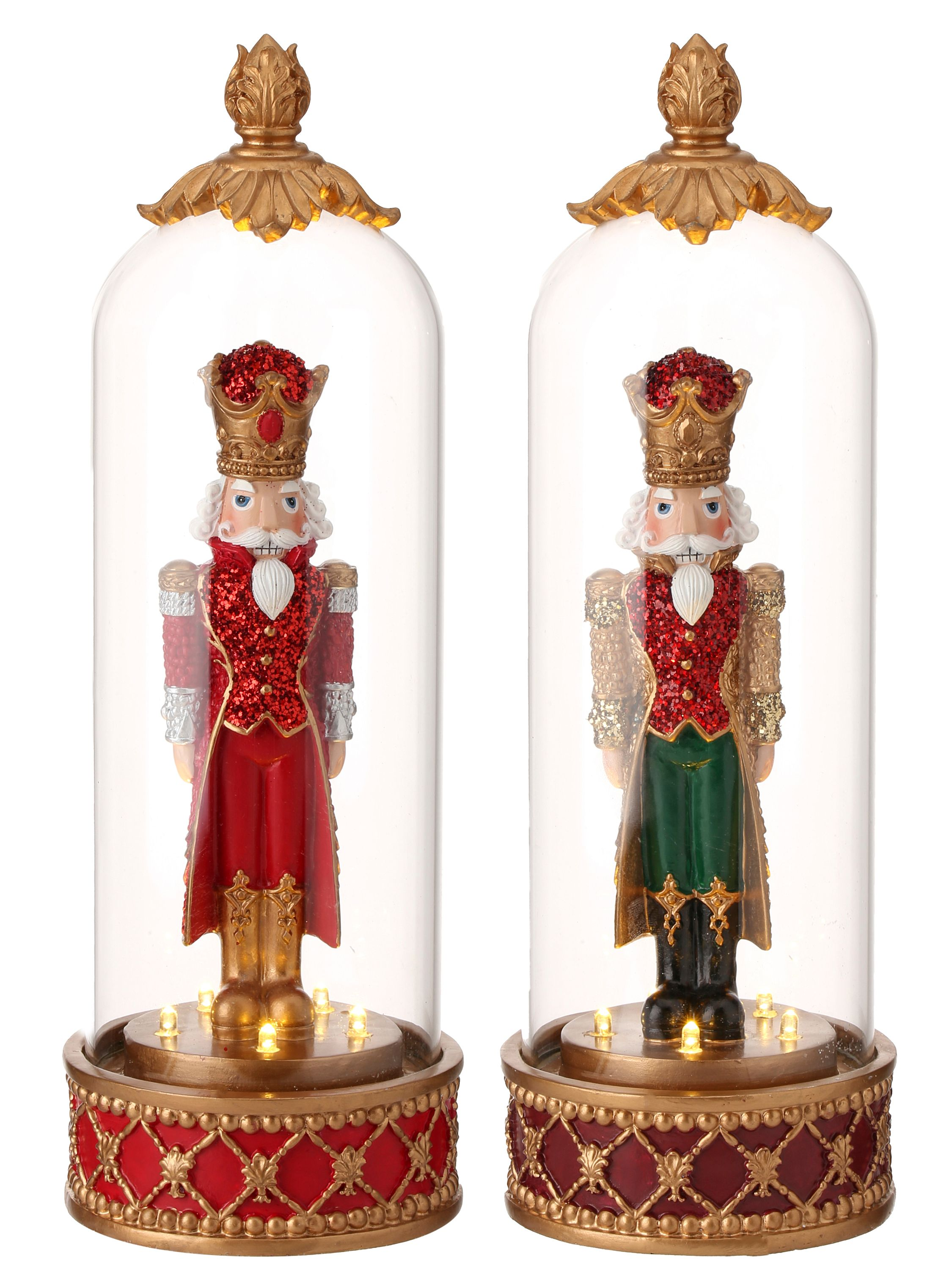 Two 13.5-inch resin nutcracker figures in glass cloches with LED lights on decorative bases.