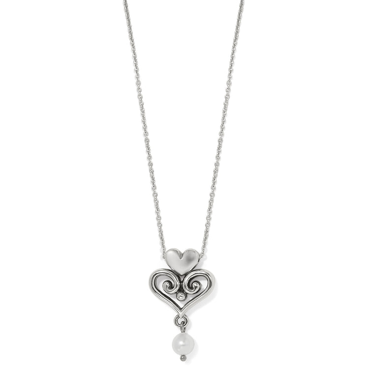 Alcazar Amor silver-plated necklace featuring a heart pendant with scrollwork and a pearl drop.