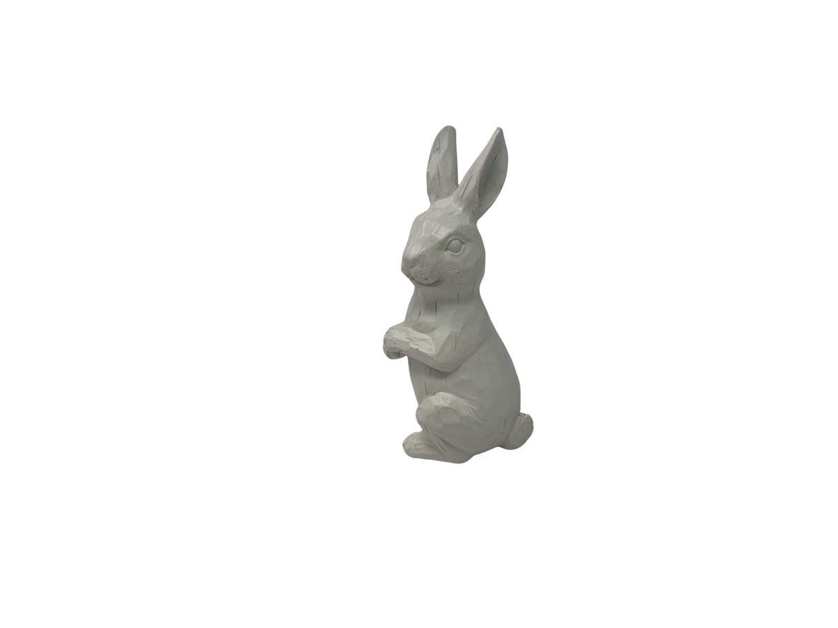 Small white resin standing rabbit figurine with a carved wood-like texture.